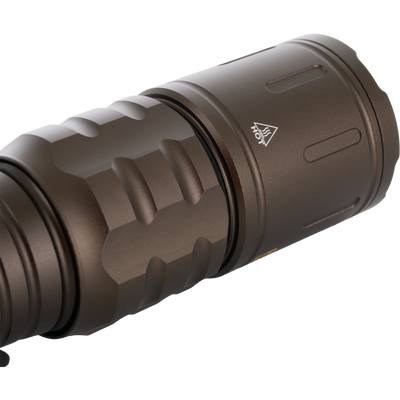 Close-up of Lumen Flashlight EVO1000, showcasing its metal body with machined grip, O-ring seal, and heat-dissipating fins, ideal for versatile outdoor use.