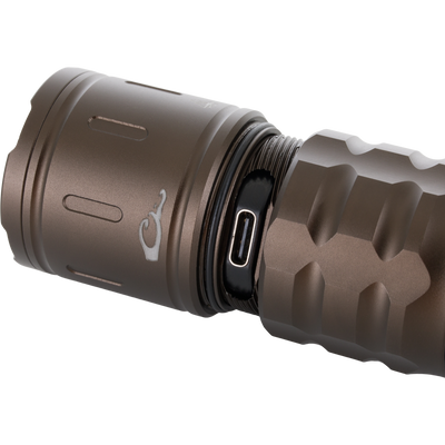 Close-up of Lumen Turbo Flashlight EVO2200, showcasing its rugged metal body with a knurled bezel, USB-C port, and threaded sections for durability and high-performance lighting.
