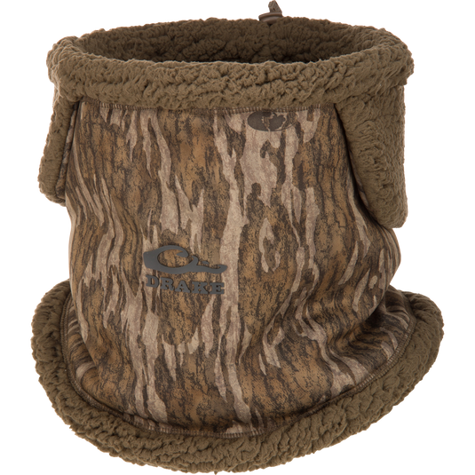 LST Sherpa Fleece Neck Gaiter in Mossy Oak Bottomland camo-patterned fleece with fuzzy olive green trim.