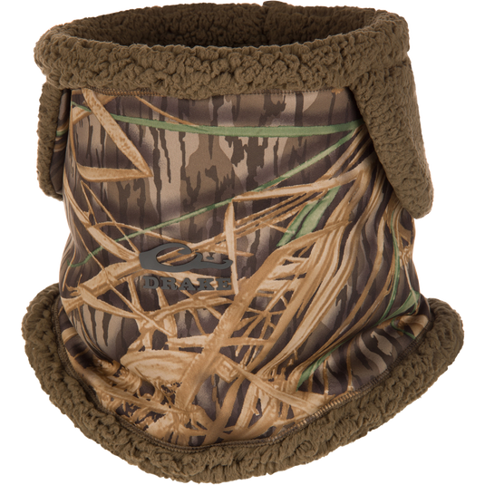 LST Sherpa Fleece Neck Gaiter in Mossy Oak Original Shadow Grass camo-print sherpa fleece with a dark olive textured lining and a front logo.