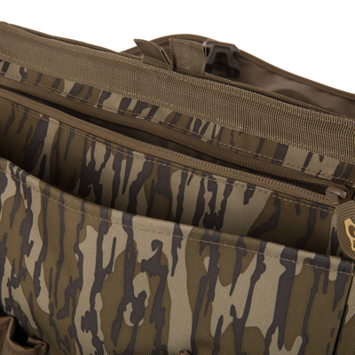 Hardline Shoulder Blind Bag with tiger-stripe camo pattern, featuring pockets, heavy-duty webbing, and a zipper, designed for durable, waterproof hunting gear storage.