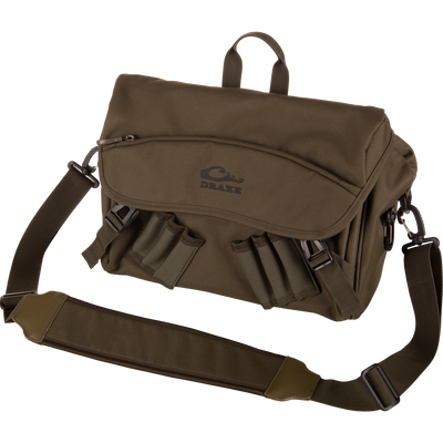 Hardline Shoulder Blind Bag with adjustable padded strap, top handle, multiple exterior pockets, and quick-release buckles, designed for durable, waterproof hunting gear storage.