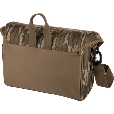Hardline Blind Bag: Camo-patterned, soft-sided shoulder bag with reinforced handle, exterior pocket, side zipper, and adjustable strap, ideal for waterfowl hunting in tough conditions.