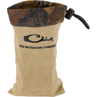 Waxed Canvas Shell Pouch with camo cuff, featuring The Waterfowl Company logo, black cord, and toggle, designed for durability and waterproof outdoor use.