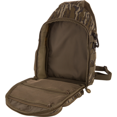 Hardline Sling Pack with tiger-stripe camouflage design, featuring a durable polyester shell, zippered compartments, mesh pocket, and carabiner for organized, rugged outdoor utility.