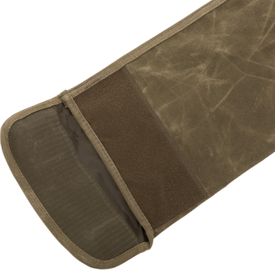 Close-up of the Wax Cotton Gun Sleeve interior showing Velcro stitching and durable wax canvas, designed for secure shotgun transport up to 50 inches.