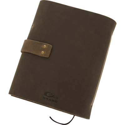 Drake Leather Wingshooters Hunting Log features a brown leather cover with brass snaps, embossed logo, and pen loop, ideal for documenting detailed hunting experiences.