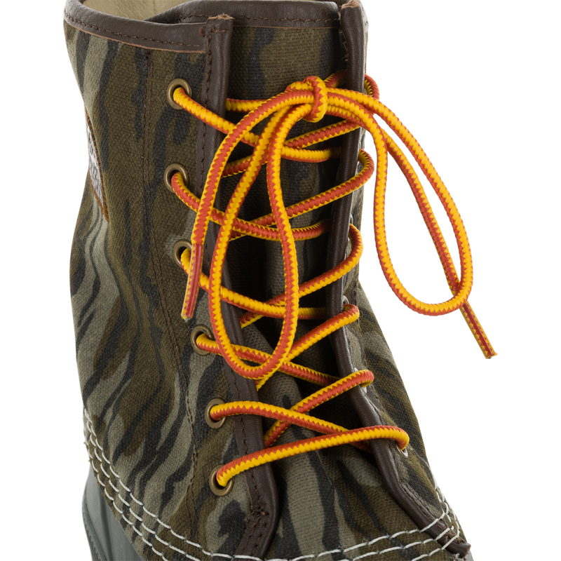 Throwback 80 Waxed Canvas Lace Up Duck Boot with camouflage pattern, brown leather trim, and yellow-orange laces, ideal for rugged outdoor use.