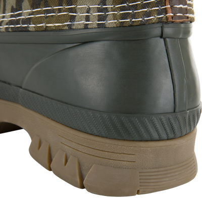 RTL - Throwback 80 Waxed Canvas Slip On Duck Boot, highlighting its waterproof rubber sole and camo-patterned fabric cuff, ideal for rugged outdoor performance.