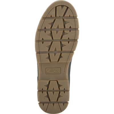 RTL - Throwback 80 Waxed Canvas Slip On Duck Boot outsole close-up, showcasing rugged rubber tread with deep lugs and molded logo for dependable traction.
