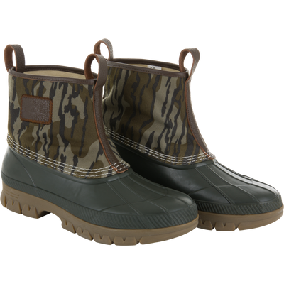 RTL - Throwback 80 Waxed Canvas Slip On Duck Boot with waterproof rubber sole, camouflage canvas upper, and pull-on loops, ideal for rugged outdoor conditions.