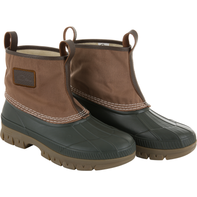 RTL - Throwback 80 Waxed Canvas Slip On Duck Boot, featuring a black rubber sole and brown canvas upper with leather trim and pull-on loops for durability.
