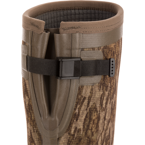 Close-up of BMF1600 17 Rubber Boot with Primaloft Insulation, featuring neoprene lining, adjustable strap, and nylon buckle. Designed for durability and comfort in hunting conditions.