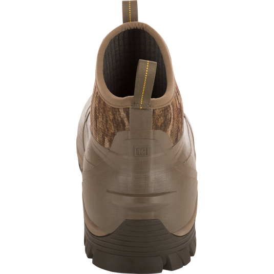 Rear view of BMF1600 17 Rubber Boot with Primaloft Insulation, featuring rubberized shell, lugged outsole, fabric upper, and size 12 molded heel.