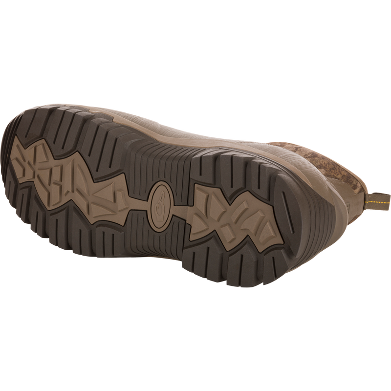 Underside view of BMF1600 17 Rubber Boot showcasing aggressive tread pattern, emphasizing durability and traction for hunting.