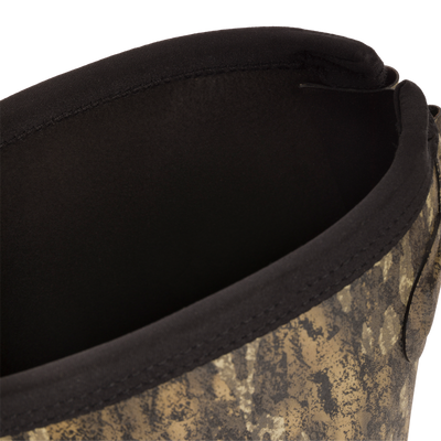 Close-up of the EST Uninsulated 16 Hybrid Mudder Boot 3.0, showcasing its camouflage-patterned exterior and black interior lining, emphasizing durability and comfort.