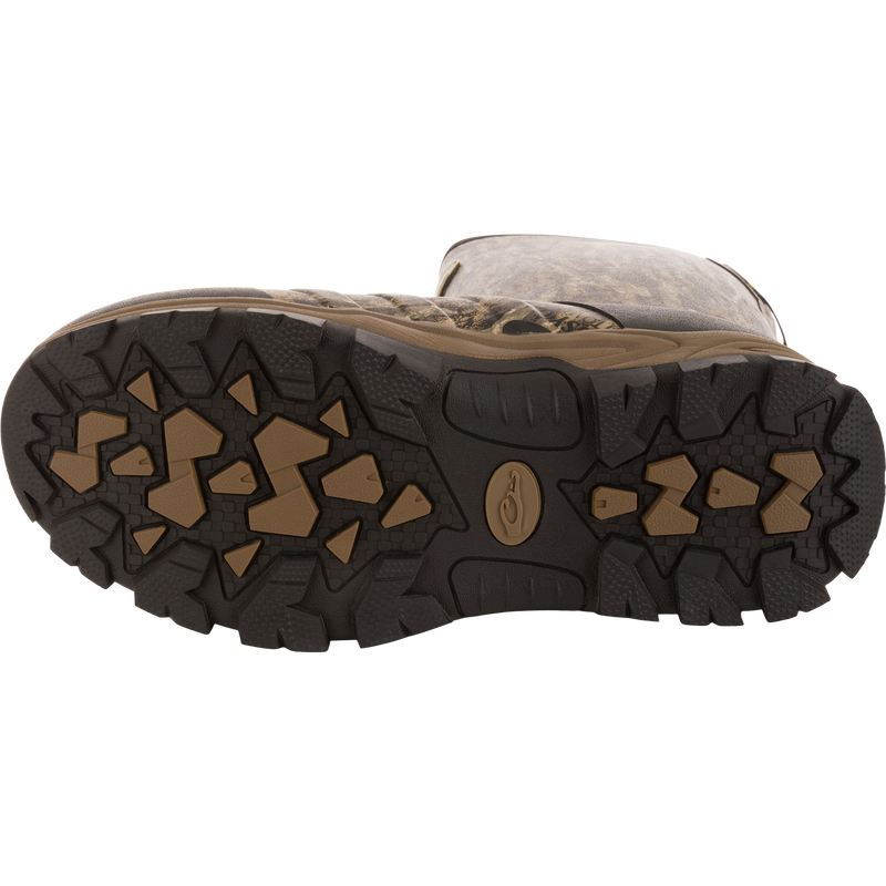 MST 16 Hybrid Mudder Boot 3.0's rugged sole with black and brown rubber lugs, designed for traction on challenging terrain.
