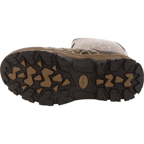 MST 16 Hybrid Mudder Boot 3.0's rugged sole with black and brown rubber lugs, designed for traction on challenging terrain.