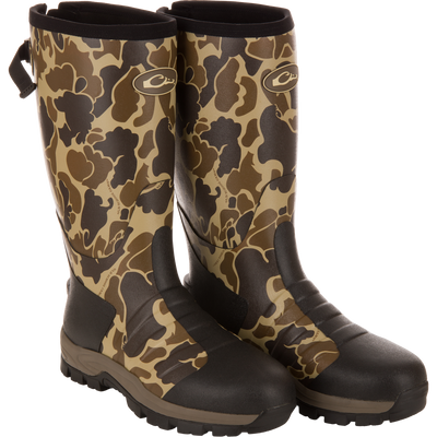 MST 16 Hybrid Mudder Boot 3.0, camo-pattern, rugged Wellington-style with lug soles, ideal for hunting, featuring neoprene, Thinsulate™ insulation, and EVA midsole for comfort.