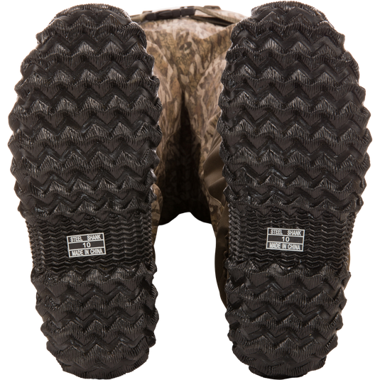 Hardline Uninsulated Breathable Wader soles with deep zig-zag tread, STEEL SHANK 10 MADE IN CHINA label, showcasing durability and reinforced design for outdoor adventures.