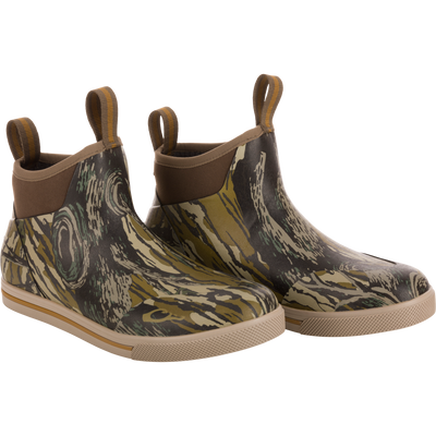 A pair of camouflage patterned waterproof boots designed for outdoor use, featuring a non-marking rubber outsole.