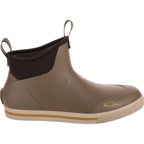 Camp Deck Boot, ankle-height slip-on, waterproof with molded rubber sole, neoprene collar, fabric pull-tabs, non-marking outsole for traction, ideal for wet conditions.