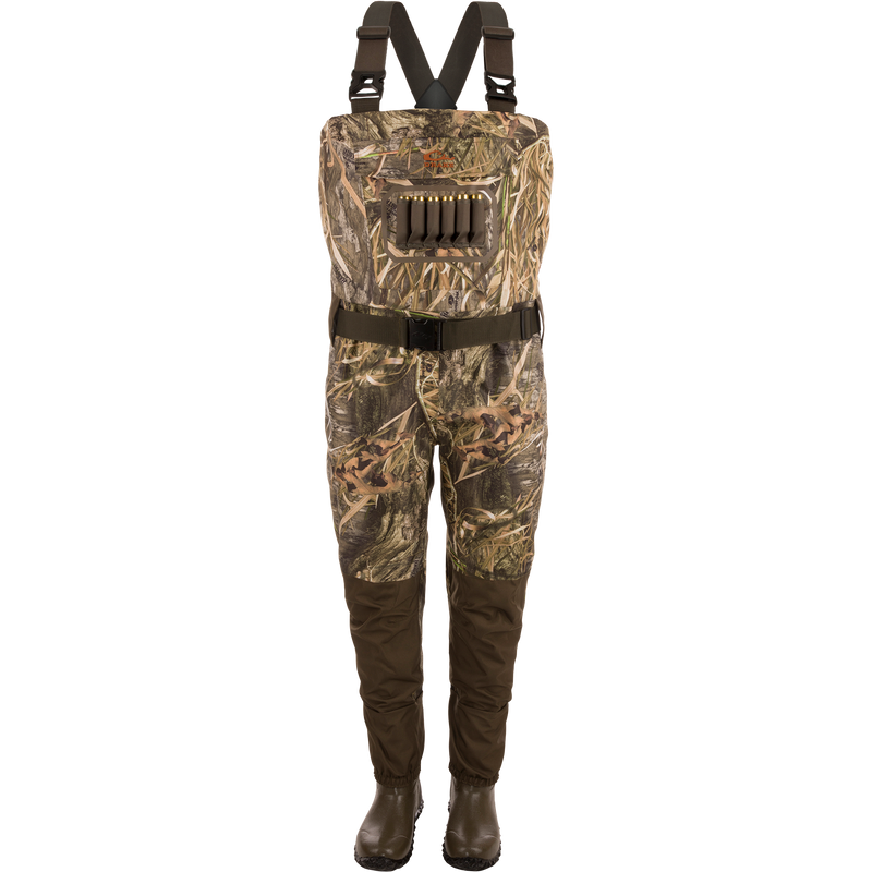Hardline Insulated Breathable Wader with camouflage pattern, adjustable straps, ammo holder, and built-in rubber boots for waterfowl hunting and angling in cold conditions.