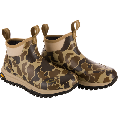Offroad Rubber Deck Boots with camouflage print, featuring waterproof construction, rugged treaded sole, and pull tabs for easy wear, designed for demanding waterfowl conditions.