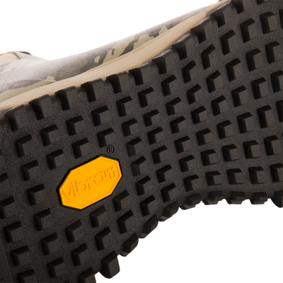 Close-up of Offroad Rubber Deck Boots' black outsole, featuring square lugs and yellow Vibram logo, highlighting durability and grip for demanding waterfowl conditions.