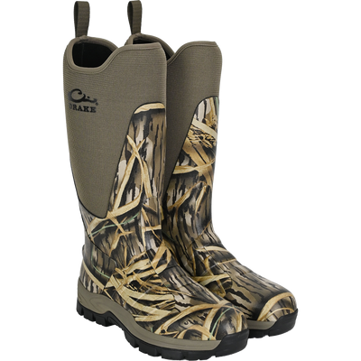 The Waterfowl Uninsulated 16″ Camp Boot features a neoprene upper, rugged rubber outsole, side pull loops, and a Mossy Oak Original Shadow Grass camo pattern for durable waterproof protection.