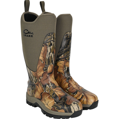 The Waterfowl Uninsulated 16″ Camp Boot in Mossy Oak Fall Foliage features neoprene uppers, thick black rubber outsoles, and pull-on loops—ideal for outdoor use.