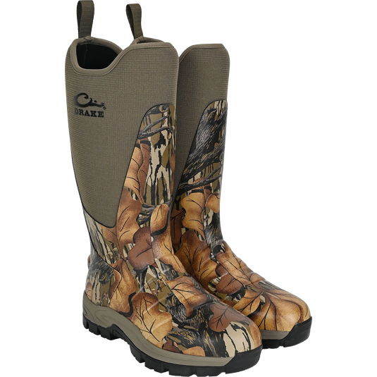 The Waterfowl Uninsulated 16″ Camp Boot in Mossy Oak Fall Foliage features neoprene uppers, thick black rubber outsoles, and pull-on loops—ideal for outdoor use.