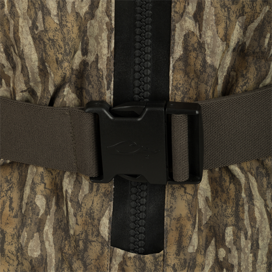 Uninsulated Guardian Elite HND Front Zip Waders - Realtree: Close-up of zipper & buckle on durable outdoor gear.