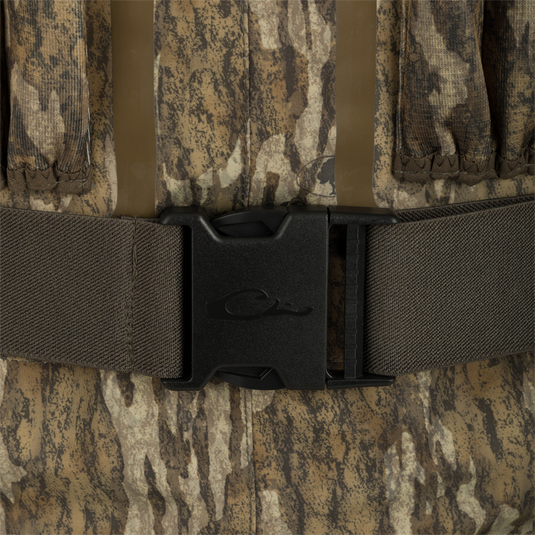 Uninsulated Guardian Elite Vanguard Breathable Wader: Black buckle on camouflage vest, close-up of fabric and strap.