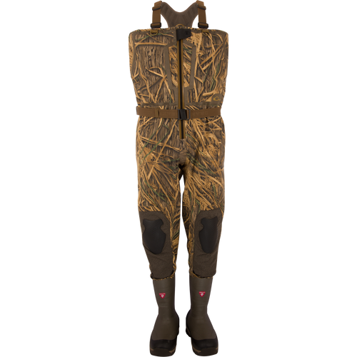 BMF1600 Kevlar Wader with Primaloft, featuring camouflage pattern, built-in rubber boots, adjustable harness, reinforced knees, and front-zip entry for waterfowl hunting.
