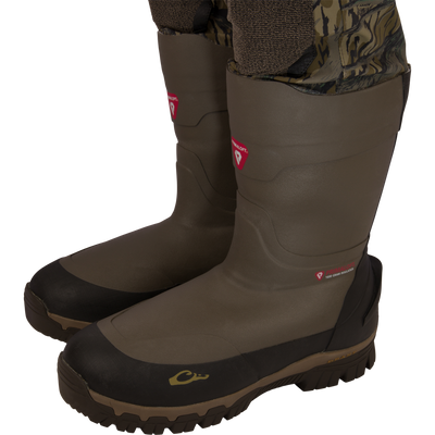 BMF1600 Kevlar Wader with Primaloft, featuring olive-green insulated rubber boots, black reinforcements, and heavy-tread soles, ideal for cold-weather hunting and wading.