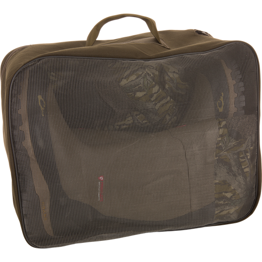 BMF1600 Kevlar Wader with Primaloft inside an olive-green travel packing cube, visible through mesh panel, showcasing its compact storage for hunting gear.