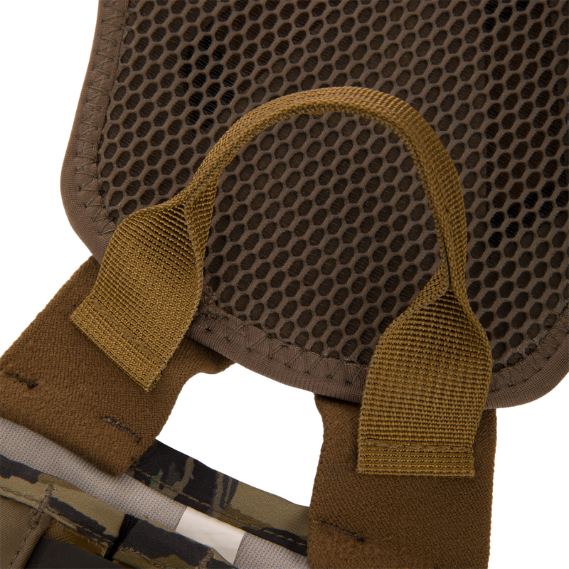 Close-up of BMF1600 Kevlar Wader's mesh-padded back panel with honeycomb ventilation and olive-drab webbing straps, highlighting durability and advanced design.