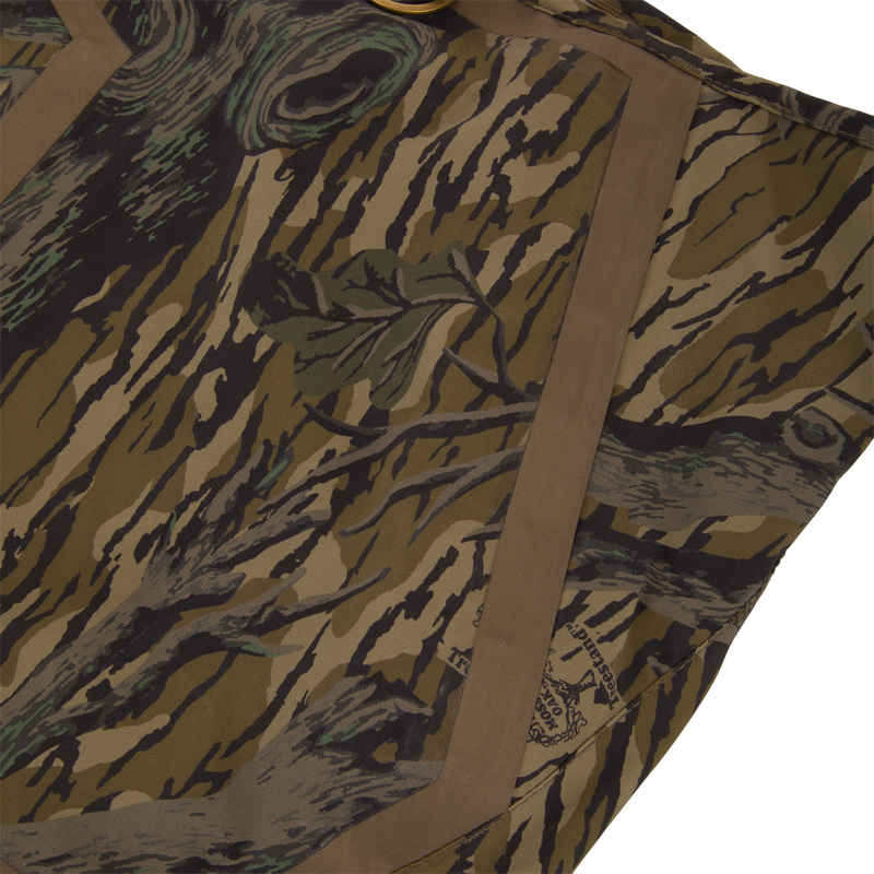 BMF1600 Kevlar Wader with Primaloft, showcasing tiger-stripe camo-patterned fabric, tan binding, and metal ring, designed for superior durability and water resistance.