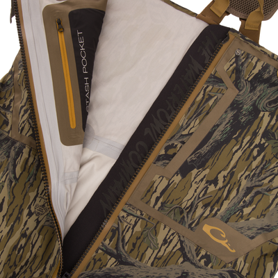 Close-up of the BMF1600 Kevlar Wader with Primaloft showing the interior stash pocket, camo fabric, and YKK™ Aquaseal® waterproof zipper, highlighting advanced design features.