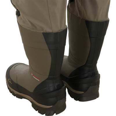 Rear view of tan Drake X Ducks Unlimited BMF1600 Kevlar Wader waterproof hunting waders featuring insulated rubber boots.