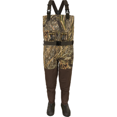 Insulated Guardian Elite Vanguard Breathable Waders with built-in boots, camo bib, adjustable straps, and utility pockets, designed for waterproof hunting and fishing.