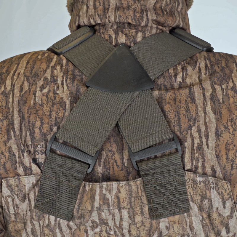 Close-up of straps on back of camouflage Drake Insulated Breathable Chest Wader with sewn-in liner, showcasing HD2 material for protection and LokDown insulation for warmth.
