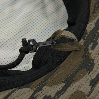 Close-up of the Drake Shoreline Boonie Hat, highlighting its breathable micro vent holes and adjustable drawcord, designed for sun protection and odor control.