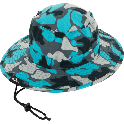 Drake Shoreline Boonie Hat with wide-brim, camo-pattern, adjustable chin cord, and micro vent holes for breathability. Features cooling tech, UPF50 protection, and antimicrobial treatment.