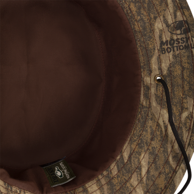 Close-up of the Duk Boonie Hat, featuring a full brim and adjustable drawstring, crafted from 100% cotton for all-weather wear.