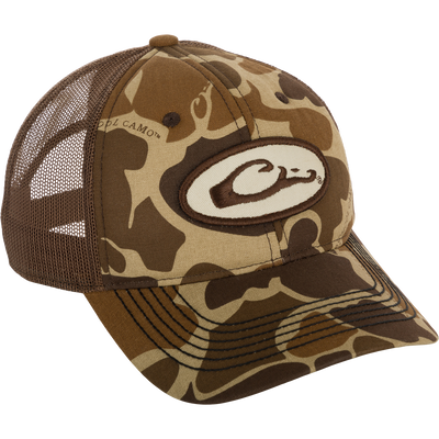 A brown hat with a camouflage design and a logo on it, featuring a foam-lined front and an adjustable closure. Perfect for everyday wear and outdoor activities.