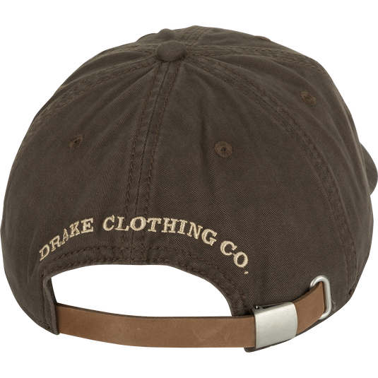 A low-profile Cotton Twill Logo Cap with a leather strap back and brass buckle. Stay cool and stylish while conquering your goals.