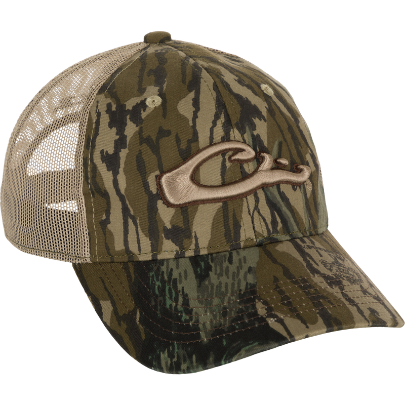 A 6-panel camo mesh-back cap made from 100% cotton. Features low-profile construction, structured front panels, and a secure hook & loop back closure. Drake 