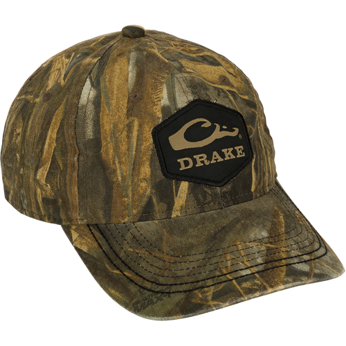 Camo Cotton Twill Hex Patch Cap - Realtree: A low-profile, unstructured hat with a logo patch. 60% cotton/40% polyester for durability. Hook and loop closure for a secure fit. Ideal for outdoor adventures.
